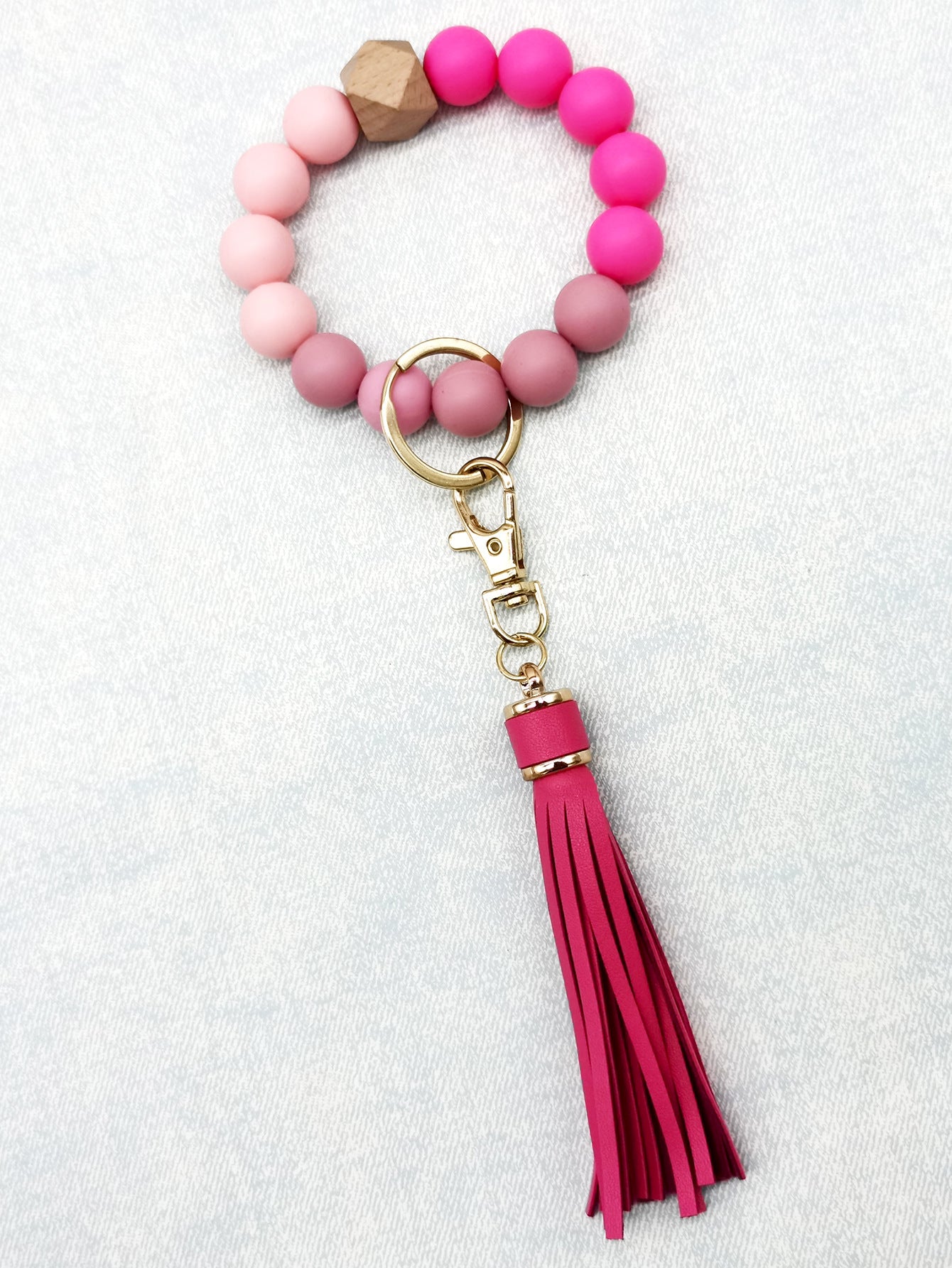 Pulsera de cuentas de silicona con borlas al por mayor llavero de muñeca